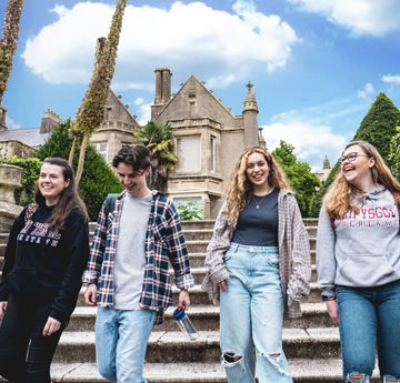 students walking down steps on Singleton Campus