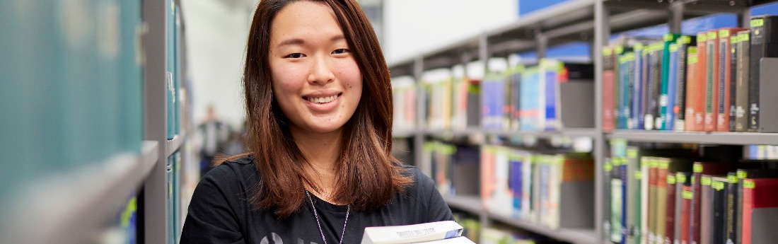 Student in library