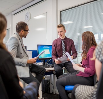 Group of people having discussion