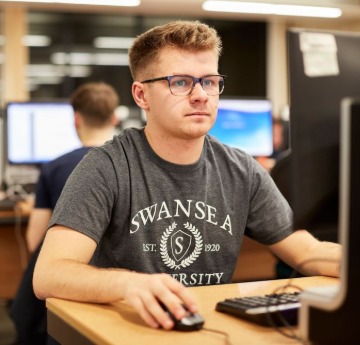 Student sat at computer