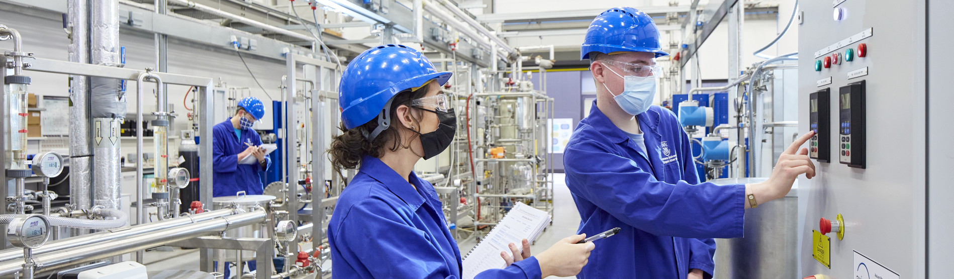 Chemical Engineering students using equipment