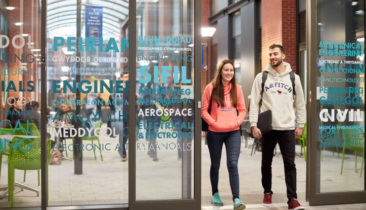 Student walking through Engineering Central