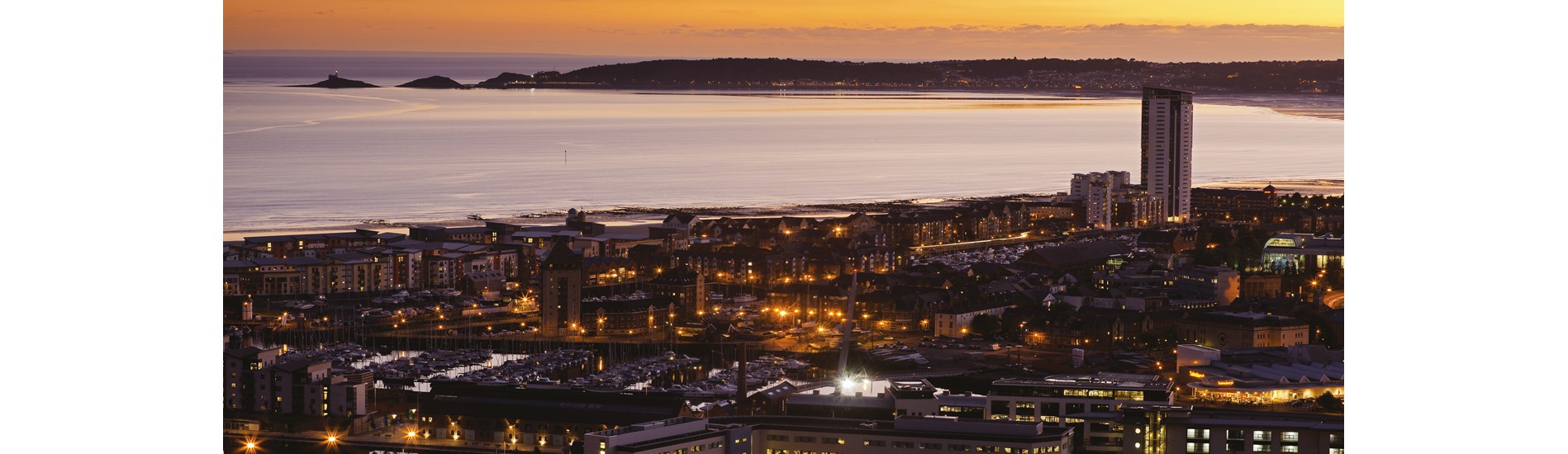 Sunset areal view over Swansea City and the bay