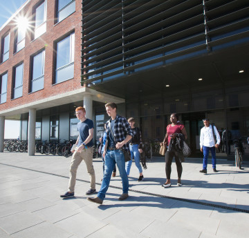 Students outside the Management building