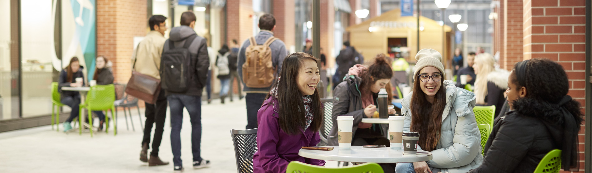 Students drinking coffee in Engineering Central