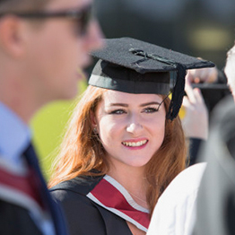 Girl at graduation smiling