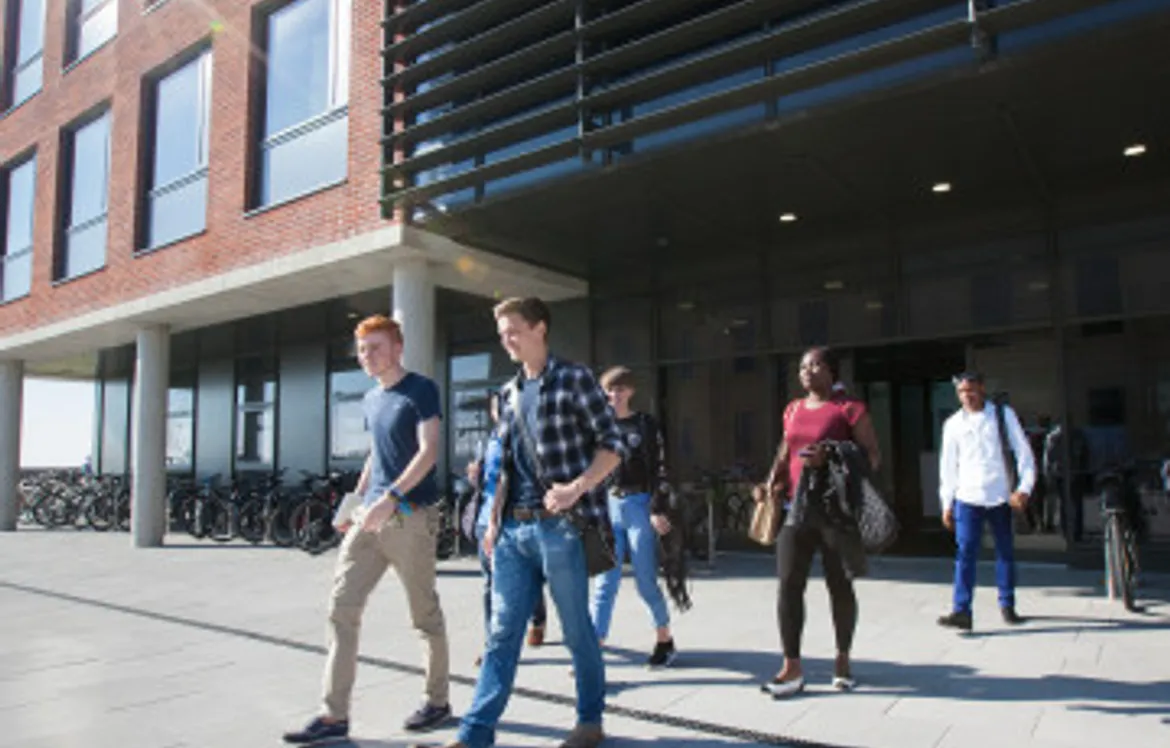 Students walking out of building