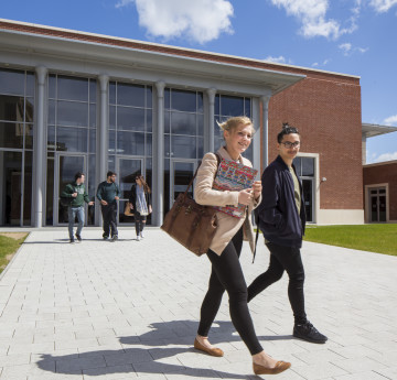 Students walking away from Bay Library