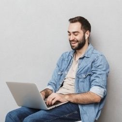 Man sitting at laptop